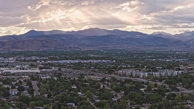 Aerial view of Denver cityscape at sunset United States.