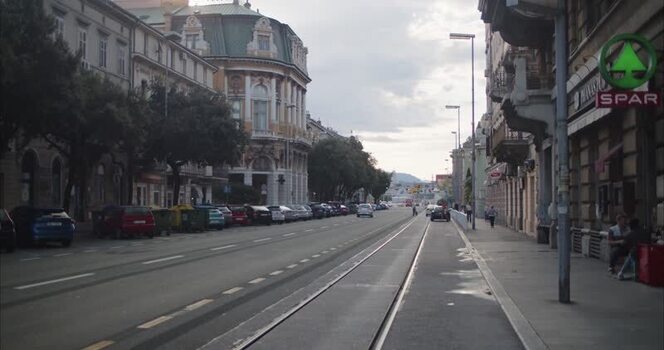 View of a historic street in Rijeka with tram tracks Croatia. View of a historic street in Rijeka with tram tracks Croatia.