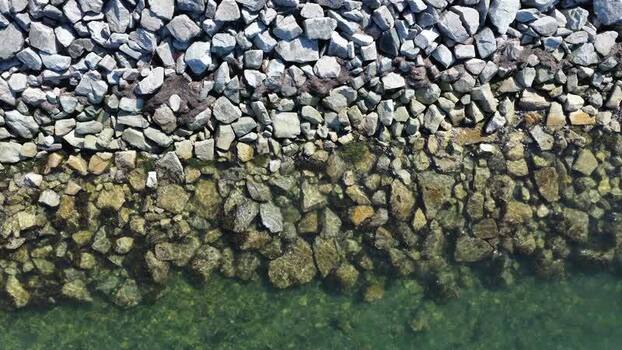 Aerial view of rocky shoreline and clear water Canada.