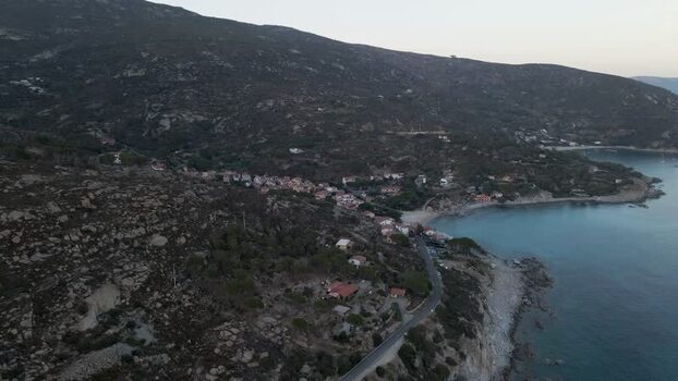 Aerial View of the coastline at sunset Seccheto Elba Island Tuscany Italy.