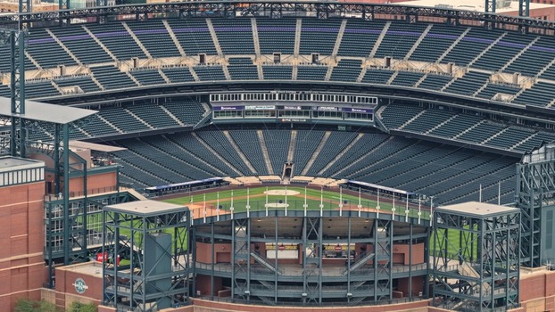 Denver Colorado United States 29 September 2026 Aerial view of Coors Field showing the baseball stadium seating bowl green field and surrounding brick architecture. Denver Colorado United States 29 September 2026 Aerial view of Coors Field showing the baseball stadium seating bowl green field and surrounding brick architecture.
