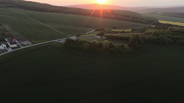 Aerial view of rolling green hills at sunset Czechia. Aerial view of rolling green hills at sunset Czechia.