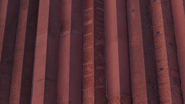 Aerial view of textured red building rooftop of Port wine cellar Portugal.