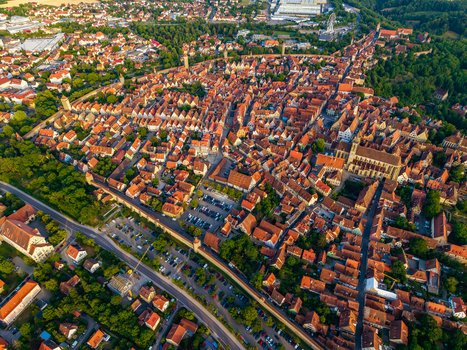 Aerial view of the historic medieval town with its iconic red tiled rooftops ancient city walls and surrounding lush greenery in Rothenburg ob der Tauber Bavaria Germany. Aerial view of the historic medieval town with its iconic red tiled rooftops ancient city walls and surrounding lush greenery in Rothenburg ob der Tauber Bavaria Germany.
