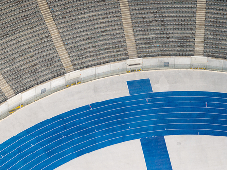 Berlin Germany 26 September 2026 Aerial view of Olympiastadion Berlin featuring its distinctive blue running track and surrounding tiered seating.