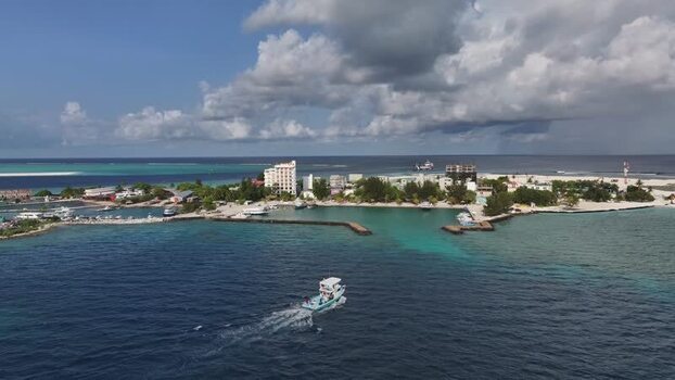 Aerial view of Gulhi island and harbor Maldives. Aerial view of Gulhi island and harbor Maldives.