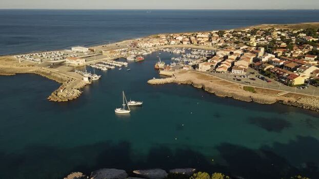 Aerial view of a coastal harbor and town France. Aerial view of a coastal harbor and town France.