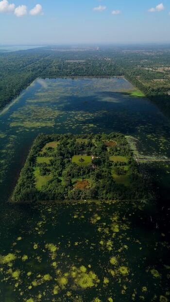 Aerial view of Neak Pean temple in the Jayatataka Baray Cambodia. Aerial view of Neak Pean temple in the Jayatataka Baray Cambodia.