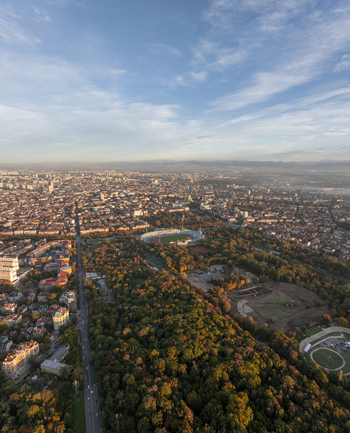 Aerial view of Vasil Levski National Stadium surrounded by lush parkland and the urban cityscape of Sofia Sofia City Province Bulgaria. Aerial view of Vasil Levski National Stadium surrounded by lush parkland and the urban cityscape of Sofia Sofia City Province Bulgaria.