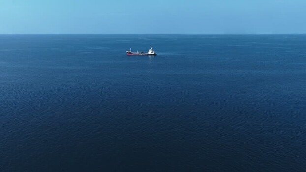 Aerial view of a cargo ship on the ocean Maldives.