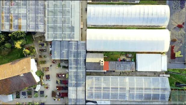 Aerial view of greenhouses and garden center Germany. Aerial view of greenhouses and garden center Germany.