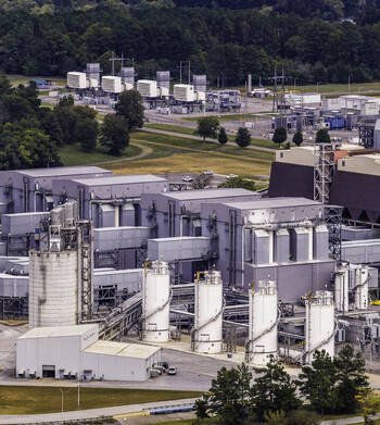 Aerial view of the Fossil Plant industrial and emissions control area with storage tanks complex piping and industrial structures in Gallatin TN United States.
