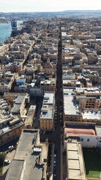 Aerial view of the historic streets and rooftops in Valletta Malta.