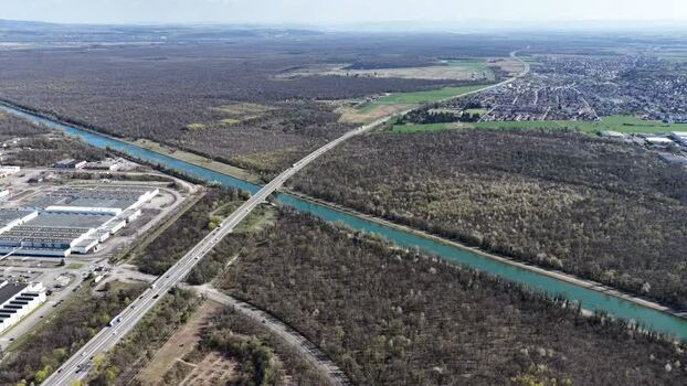 Aerial view of canal and highway France.