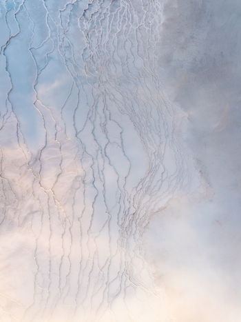 Aerial view of the geothermal landscape of Reykjanes with intricate mineral deposits and rising steam in Grindavikurbaer Iceland. Aerial view of the geothermal landscape of Reykjanes with intricate mineral deposits and rising steam in Grindavikurbaer Iceland.