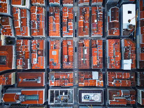 Aerial view of the historic city center of Lisbon with its characteristic red tiled rooftops narrow streets and dense urban architecture in Lisbon Lisbon Portugal.