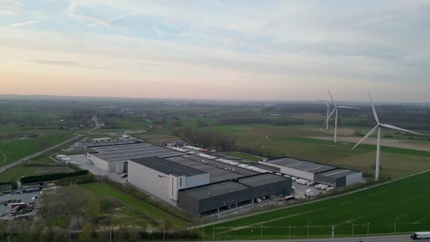 Aerial view of wind turbines and warehouses Belgium. Aerial view of wind turbines and warehouses Belgium.