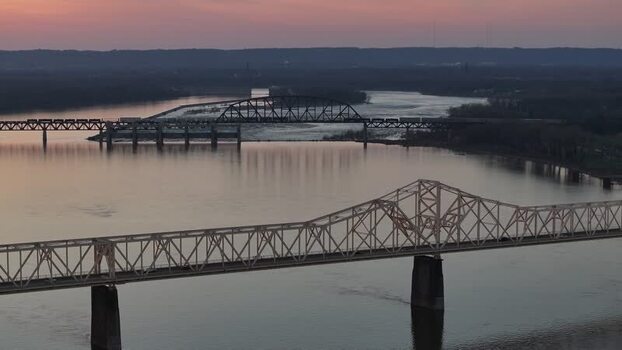 Aerial view of bridges over the Ohio River at sunset United States. Aerial view of bridges over the Ohio River at sunset United States.