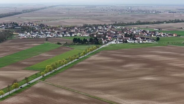 Aerial view of green fields and houses France.