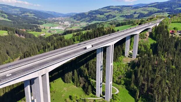 Aerial view of Lavanttal bridge and lush green mountains Austria. Aerial view of Lavanttal bridge and lush green mountains Austria.