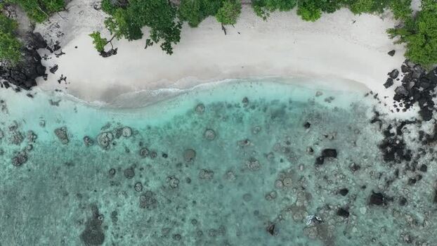 Aerial view of Sebesi Island beach and coral reefs Indonesia.