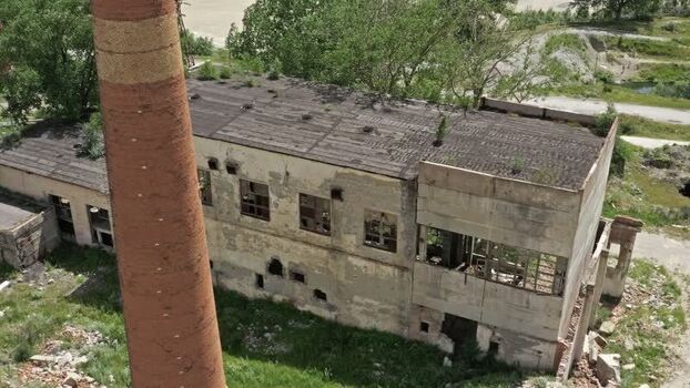Aerial view of abandoned factory in Caucasus Mountains Russia.