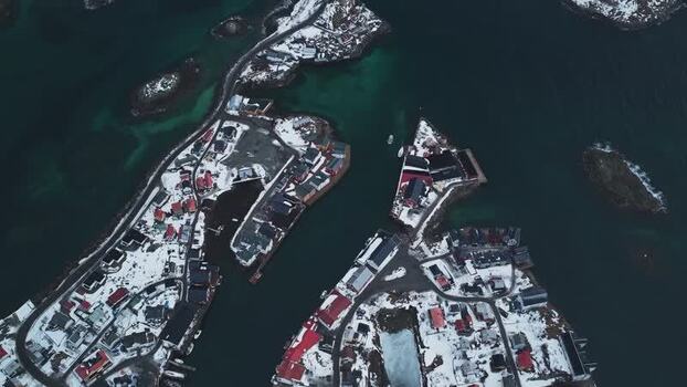 Aerial view of Henningsv&aelig;r covered in snow Norway.