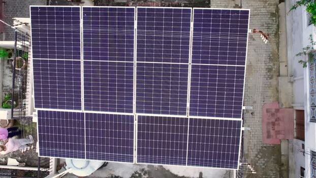 Aerial view of solar panels on a rooftop in Lucknow India.