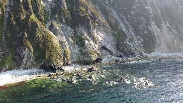 Aerial view of Glenlough Bay cliffs in Ireland.