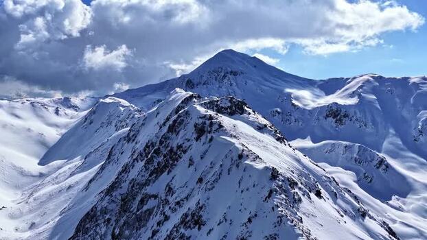 Aerial view of snowy mountain peaks in Nauders Austria.