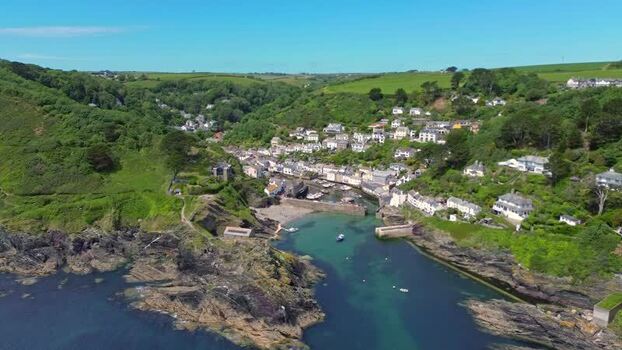 Aerial view of Polperro coastal village in Cornwall United Kingdom. Aerial view of Polperro coastal village in Cornwall United Kingdom.