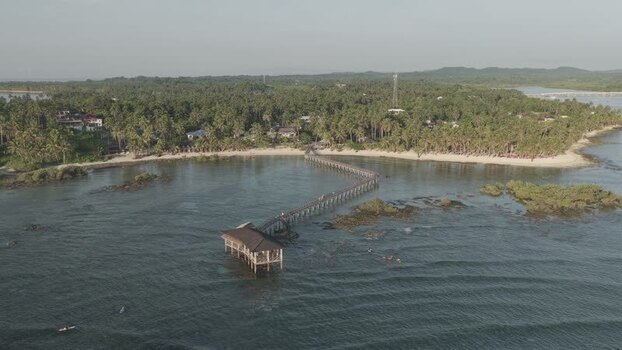 Aerial view of Cloud 9 boardwalk and beach Philippines. Aerial view of Cloud 9 boardwalk and beach Philippines.