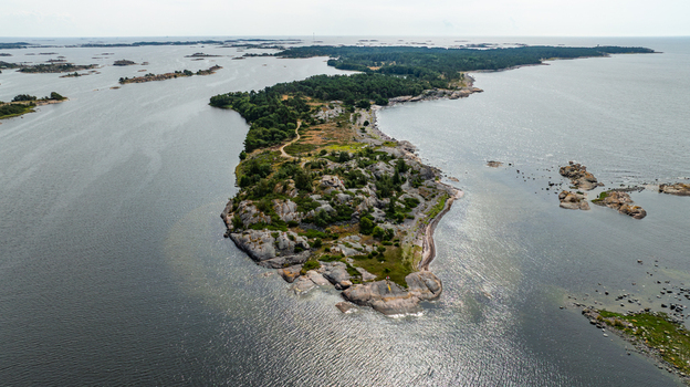 Aerial view of Oro Fortress Island surrounded by the Baltic Sea with rocky coastlines and lush forests in Oro Varsinais Suomi Finland. Aerial view of Oro Fortress Island surrounded by the Baltic Sea with rocky coastlines and lush forests in Oro Varsinais Suomi Finland.
