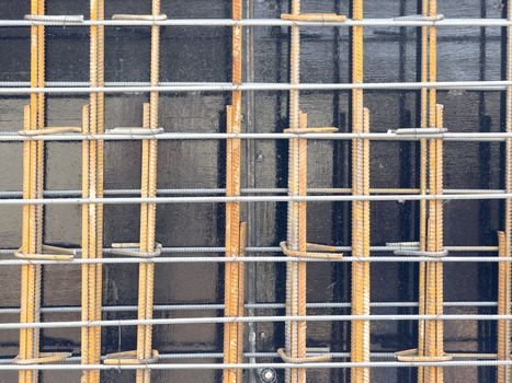 View of steel reinforcement bars arranged in a grid pattern on a construction site in Sariyer Istanbul Turkiye. View of steel reinforcement bars arranged in a grid pattern on a construction site in Sariyer Istanbul Turkiye.