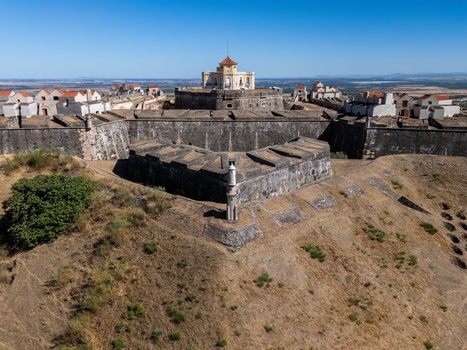 Elvas Portugal 10 September 2026 Aerial view of Forte de Nossa Senhora da Graca a historic star shaped fortress with stone ramparts and buildings set in the dry landscape. Elvas Portugal 10 September 2026 Aerial view of Forte de Nossa Senhora da Graca a historic star shaped fortress with stone ramparts and buildings set in the dry landscape.