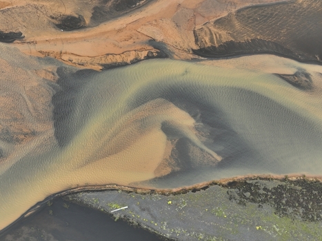 Aerial view of the river delta and sandy patterns of the landscape in Selfoss Sveitarfelagid Arborg Iceland. Aerial view of the river delta and sandy patterns of the landscape in Selfoss Sveitarfelagid Arborg Iceland.
