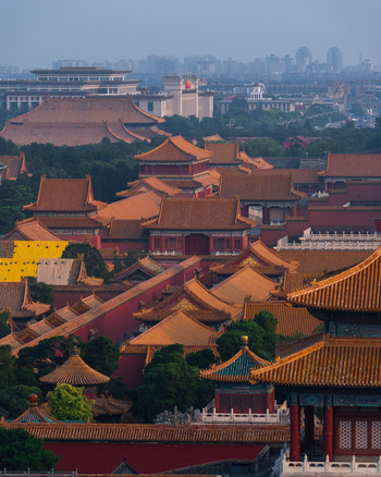 View of the Forbidden City with its iconic golden tiled roofs traditional wooden structures and historic palace courtyards in Beijing Beijing China. View of the Forbidden City with its iconic golden tiled roofs traditional wooden structures and historic palace courtyards in Beijing Beijing China.
