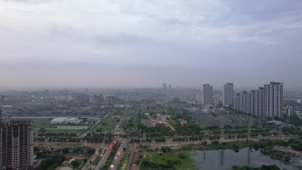 Aerial view of Gurugram skyscrapers and urban development India.
