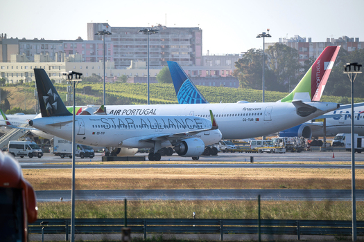 Lisboa Portugal 10 May 2026 View of commercial airplanes including TAP Air Portugal and Star Alliance livery parked on the apron at Humberto Delgado Airport. Lisboa Portugal 10 May 2026 View of commercial airplanes including TAP Air Portugal and Star Alliance livery parked on the apron at Humberto Delgado Airport.