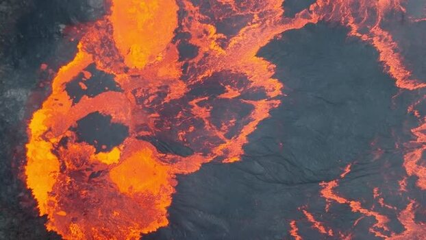 Aerial view of glowing lava flow in Danakil Desert Ethiopia. Aerial view of glowing lava flow in Danakil Desert Ethiopia.