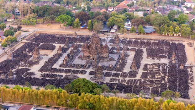 Aerial view of Sewu Temple an ancient Buddhist temple complex with numerous small shrines surrounding a central main temple set in Kecamatan Prambanan Jawa Tengah Indonesia.