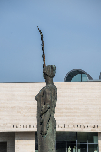 View of the bronze statue First Swallows in front of the National Gallery of Art under a clear blue sky in Vilnius Vilnius County Lithuania. View of the bronze statue First Swallows in front of the National Gallery of Art under a clear blue sky in Vilnius Vilnius County Lithuania.