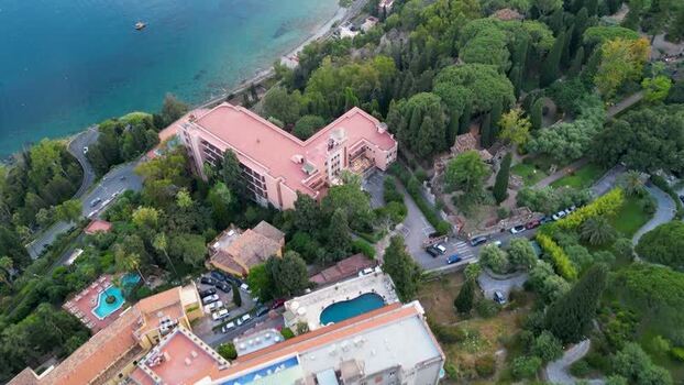 Aerial view of a luxury hotel on the coast of Taormina Italy. Aerial view of a luxury hotel on the coast of Taormina Italy.