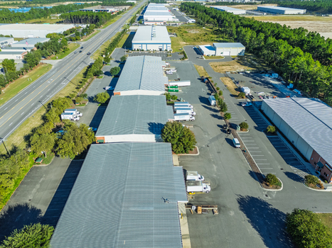 Wilmington United States 27 September 2026 Aerial view of industrial warehouses and distribution centers with loading docks and trucks in a business park. Wilmington United States 27 September 2026 Aerial view of industrial warehouses and distribution centers with loading docks and trucks in a business park.
