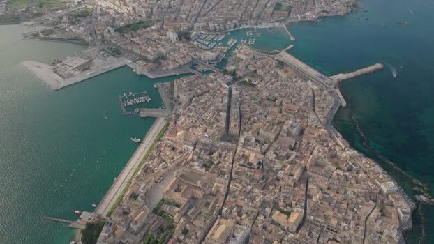 Aerial view of the historic Island of Ortigia and the harbor Italy. Aerial view of the historic Island of Ortigia and the harbor Italy.