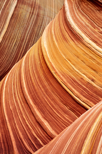 View of the swirling sandstone formations and colorful rock layers at The Wave in Kanab Arizona United States. View of the swirling sandstone formations and colorful rock layers at The Wave in Kanab Arizona United States.