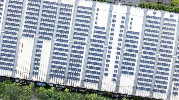 Aerial view of a large scale solar power plant with rows of solar panels on a rooftop representing renewable energy at the Mercado Livre headquarters in Osasco State of Sao Paulo Brazil.
