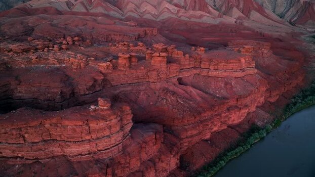 Aerial view of red rock cliffs and the Colorado River United States.