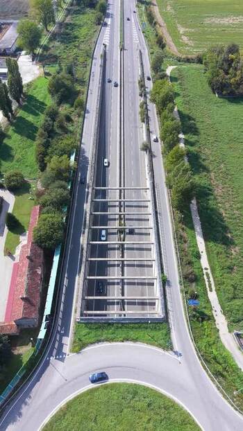 Aerial view of provincial road and tunnel in Pantigliate Italy. Aerial view of provincial road and tunnel in Pantigliate Italy.