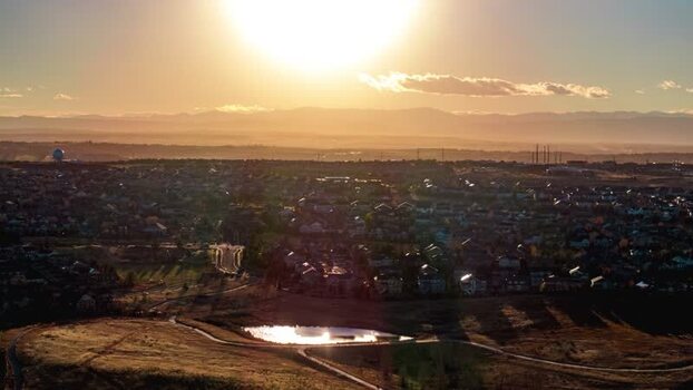 Aerial view of Denver suburbs at sunset United States.